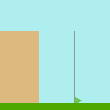 a brown cliff next to a flag pole with a green triangular flag
